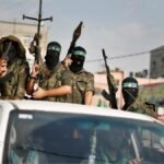 Israeli official says troops won't pull back in Gaza without 'genuine' Hamas disarmament