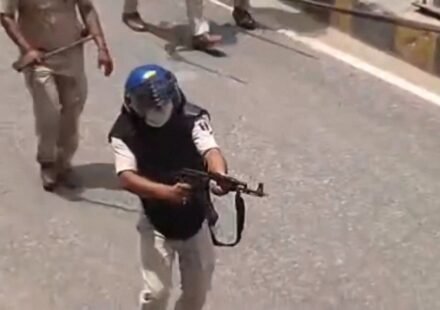 India suspends police officer for firing AK-47 at student protesters
