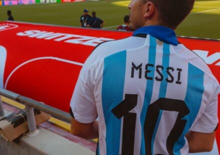 football fan wearing argentina jersey at stadium